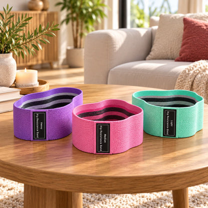 Kit elastique musculation rose violet vert sur table